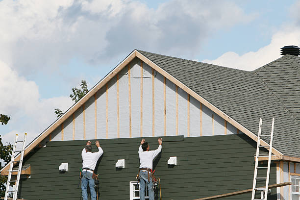 Professional Siding technician working in Lombard, IL